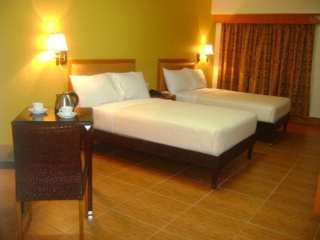 Pamulinawen Hotel Laoag Rum bild